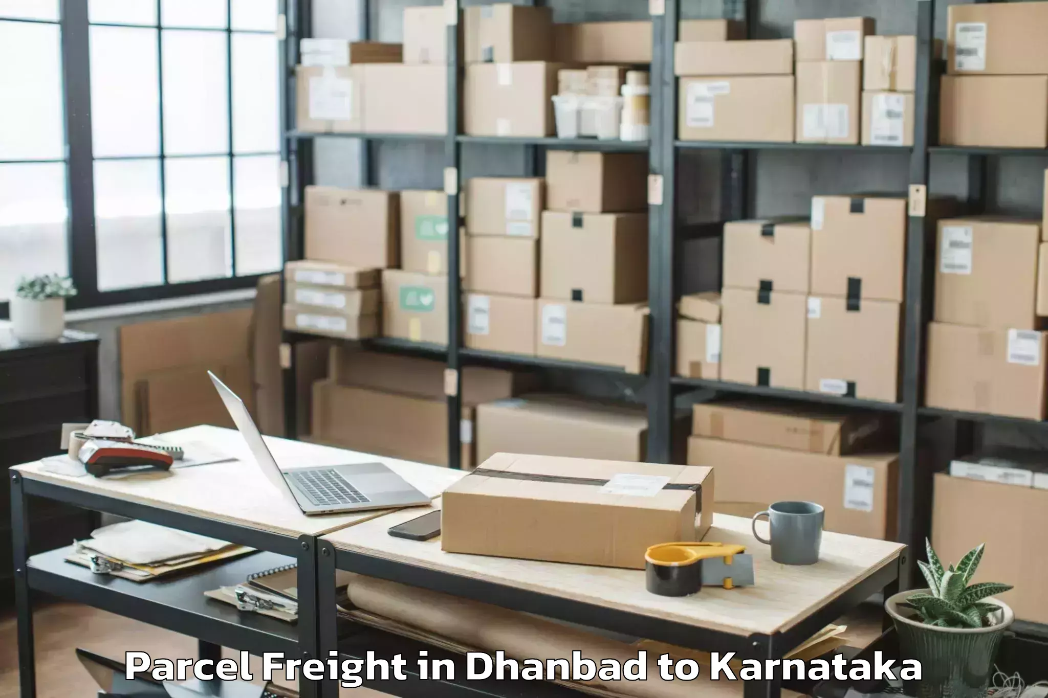 Easy Dhanbad to Arkalgud Parcel Freight Booking